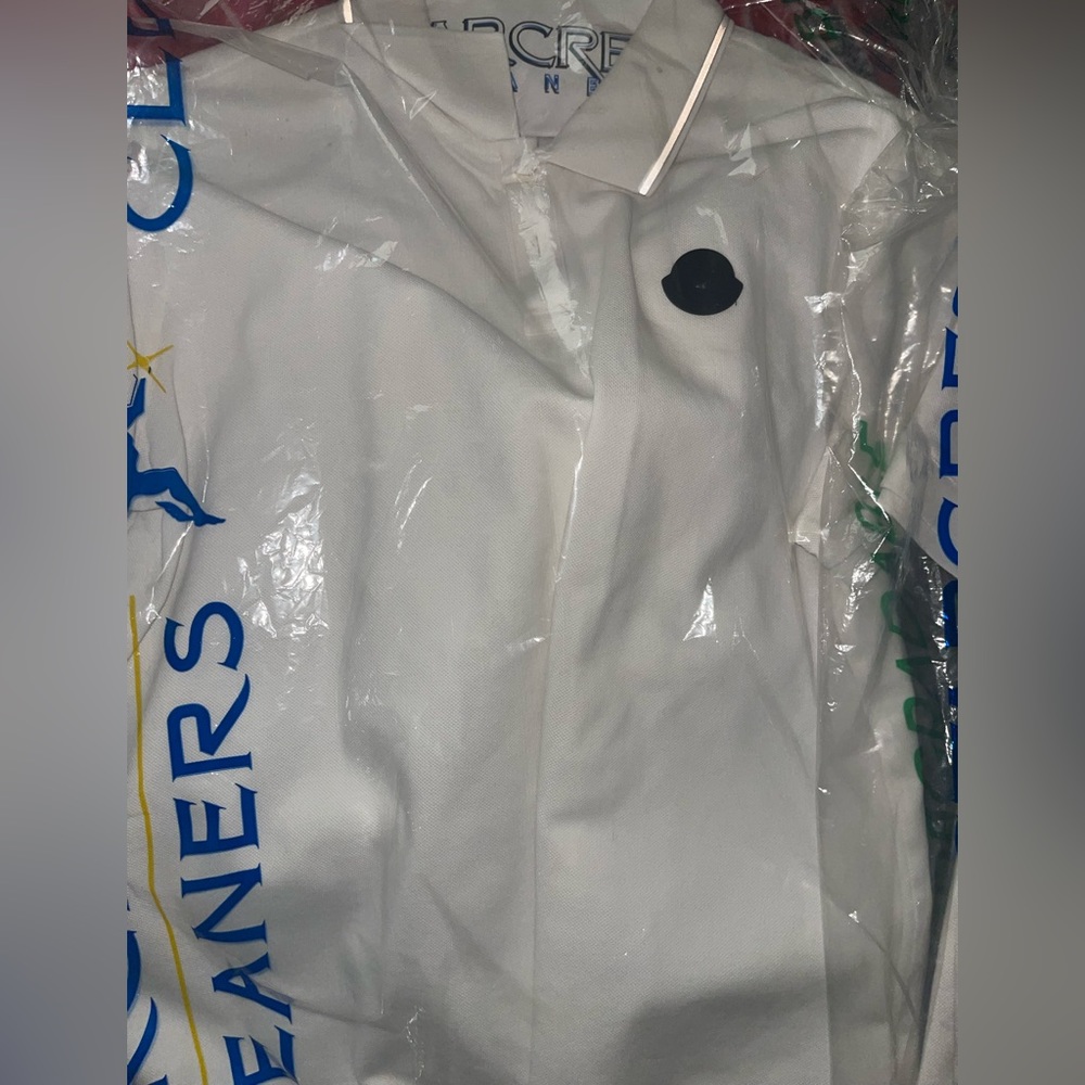 Men’s designer . Alexander McQueen polo . Moncler polo